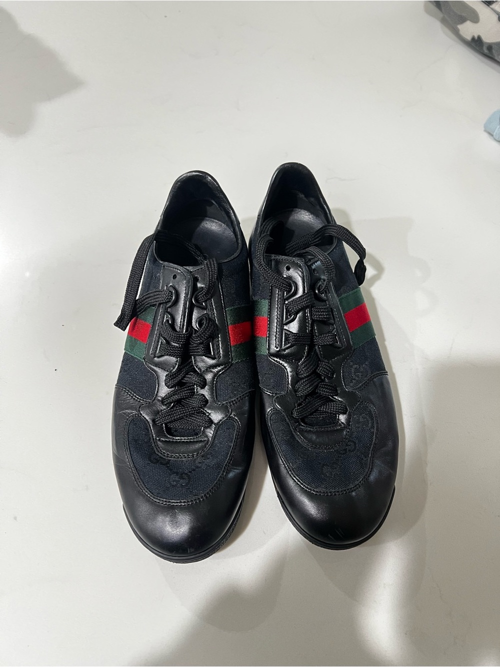 Gucci Black Sneakers with Signature Green and Red Web Stripe